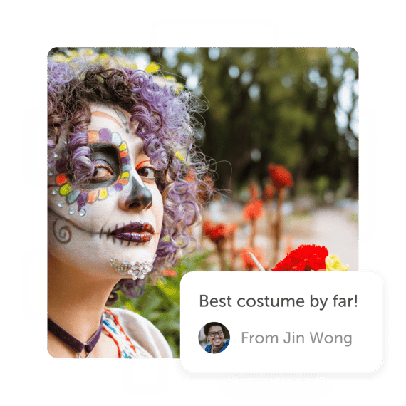 Woman in Halloween face paint and "best costume" post